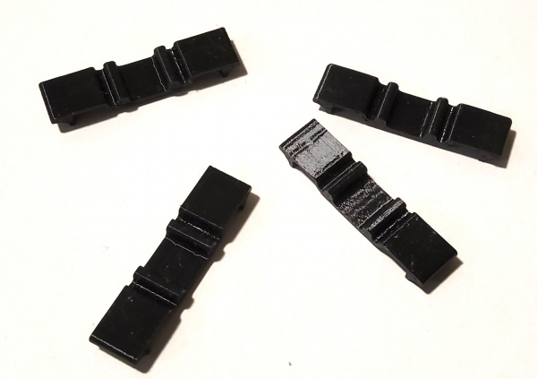 Paket 4x Auflagen Spur H0 für nicht angetriebene Achsen